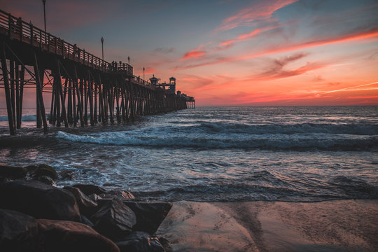 sunset on the beach and pier