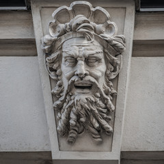 Figure of ancient old scary bearded warrior as gatekeeper, Vienna, Austria, details, closeup