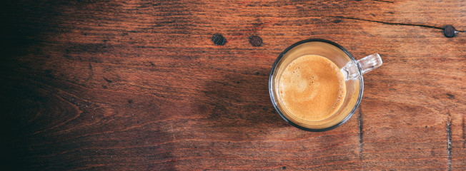 Transparent cup of espresso