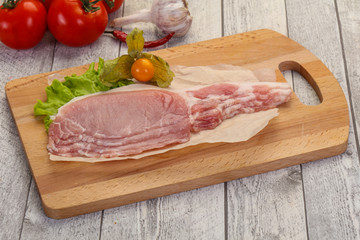 Raw pork bacon
