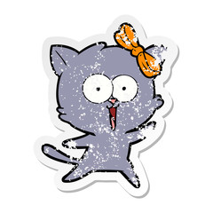 distressed sticker of a cartoon cat