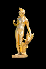 Gilded park sculpture of a naked goddess.