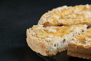 cheesecake with cottage cheese close up on dark background