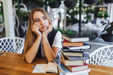 Blonde girl thinking about work