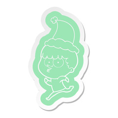 cartoon  sticker of a curious boy running wearing santa hat