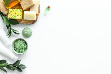 herbal cosmetic set for spa with soap and bath salt on white background flatlay mock-up