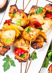 Chicken kebab grilled meat on white.