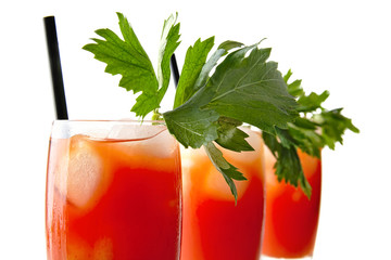 Cropped view of bloody mary with ice cubes with celery on white