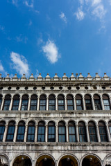 Fototapeta na wymiar Italy, Venice, Piazza San Marco, LOW ANGLE VIEW OF BUILDING AGAINST BLUE SKY