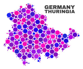 Mosaic Thuringia Land map isolated on a white background. Vector geographic abstraction in pink and violet colors. Mosaic of Thuringia Land map combined of random round points.