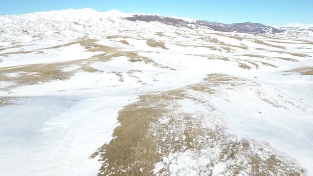 Snowy Mountain apt to use in any project that relates to travel, winter, travel, nature and the like. This footage will look great in your next edit, project, or movie. 