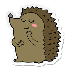 sticker of a cute cartoon hedgehog