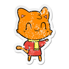 distressed sticker of a cartoon happy cat wearing scarf