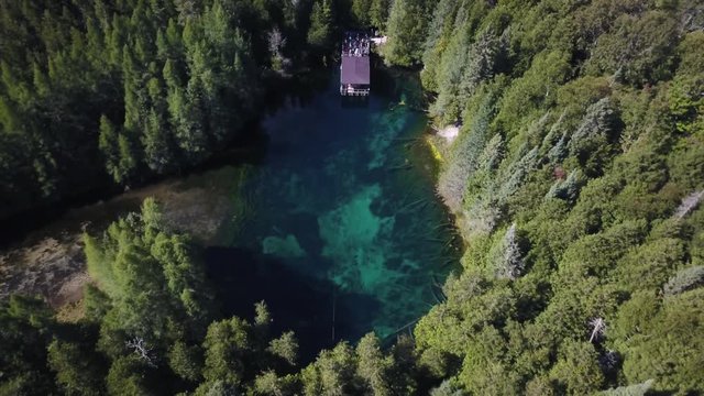 Aerial, Kitch Iti Kipi spring at park in Manistique, Michigan