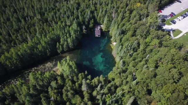 Kitch Iti Kipi spring at park in Manistique, Michigan, aerial