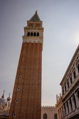 Fototapeta na wymiar Italy, Venice, St Mark's Campanile, LOW ANGLE VIEW OF HISTORICAL BUILDING AGAINST SKY