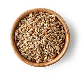 wooden bowl of wheat grains