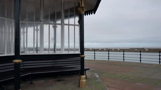 Relaxing pavilion at the seaside New Brighton Promenade afternoon