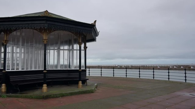 Relaxing pavilion at the seaside New Brighton Promenade afternoon