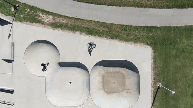 People ride bikes at Livonia Skate Park in Michigan, overhead aerial
