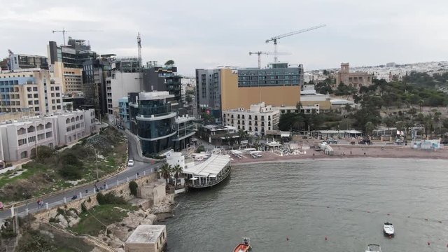 View of city in Malta near shore, aerial