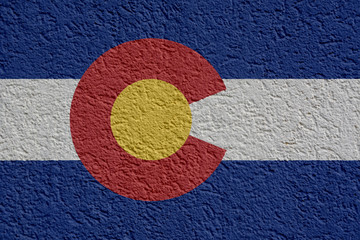US State Politics Or Business Concept: Colorado Flag Wall With Plaster, Background Texture