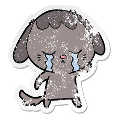 distressed sticker of a cartoon crying dog