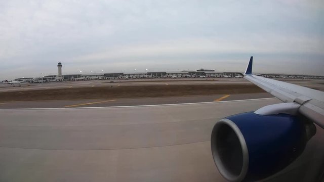 Timelapse, view of plane taking off from window