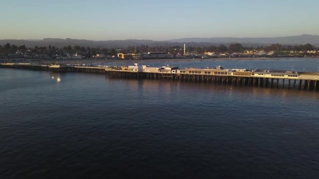 Wide aerial, buildings on pier in Santa Cruz, California