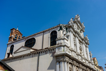 Fototapeta na wymiar Italy, Venice, a large stone building with a clock tower