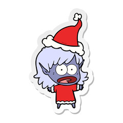 sticker cartoon of a shocked elf girl wearing santa hat