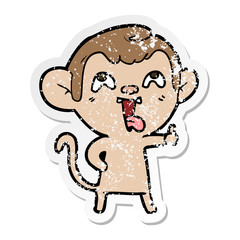 Fototapeta premium distressed sticker of a crazy cartoon monkey