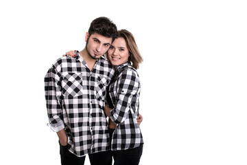 Happy young couple embracing each other isolated on white