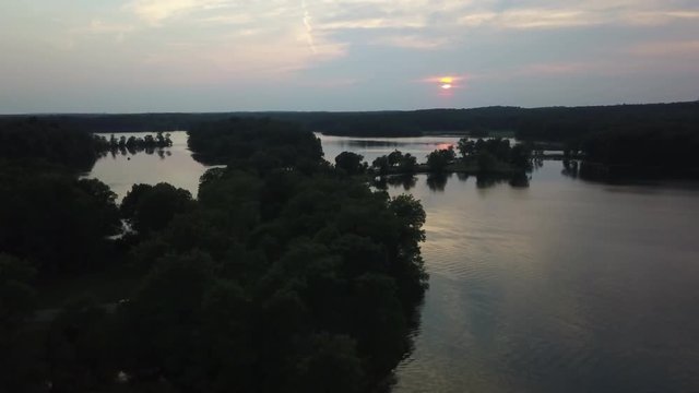 Aerial, lake at Kensington Metropark in Milford, Michigan at sunset
