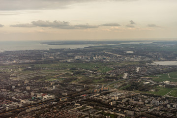 Netherlands, Hague, Schiphol, a herd of sheep grazing on a rocky hill