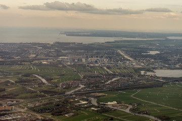 Obraz premium Netherlands, Hague, Schiphol, a field with a mountain in the background