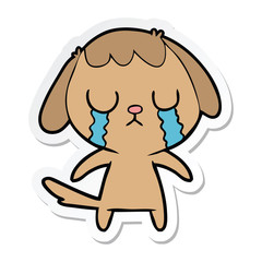 sticker of a cute cartoon dog crying