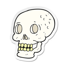 sticker of a cartoon halloween skull