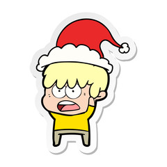 worried sticker cartoon of a boy wearing santa hat