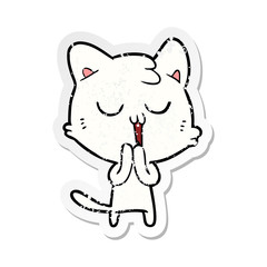 distressed sticker of a cartoon cat singing