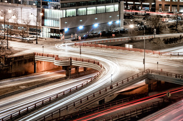 Night traffic in the West Loop neighborhood at Randolph Street and Interstate 90. Main streets in...