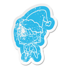 cartoon distressed sticker of a woman wearing santa hat