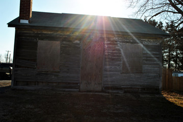 Fototapeta na wymiar Abandoned Barn in the Mourning Sunlight