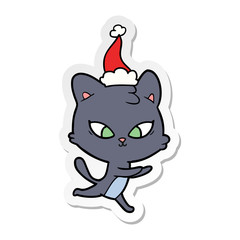 cute sticker cartoon of a cat wearing santa hat