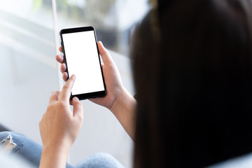 Woman using tablet Mockup for your own content  at home blank empty screen