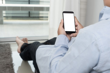 Man hand holding the black smartphone screen mockup