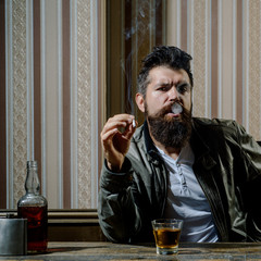 Degustation, tasting. Stop drinking. No alkohol. Smoking man. Man is smoking a cigarette. Smoke.