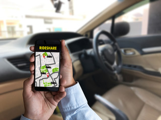 mobile application Ride share taxi service on phone man holding phone