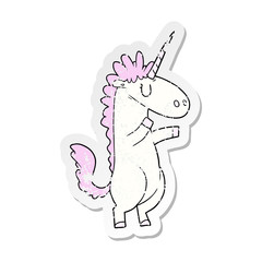 distressed sticker of a cartoon unicorn