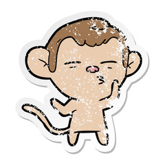 distressed sticker of a cartoon suspicious monkey